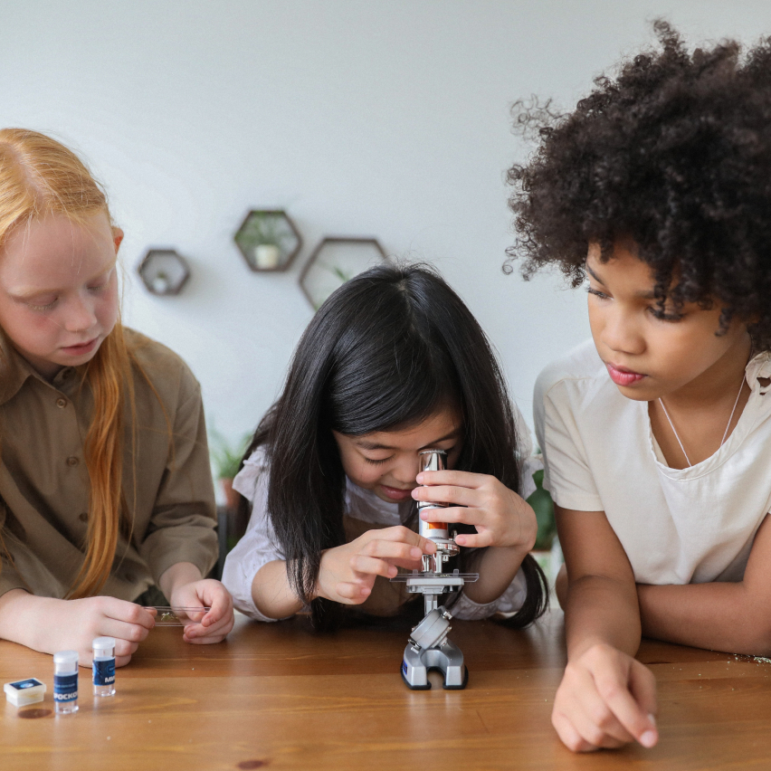 kids with microscope